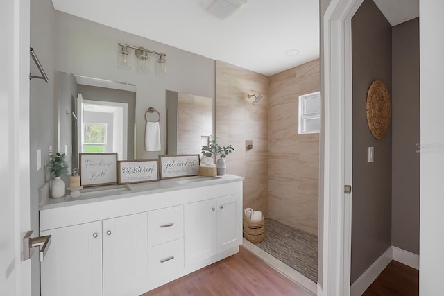 274 W Bolero Pl, Citrus Springs, FL 34434 - bathroom featuring walk in shower, vanity, and wood finished floors