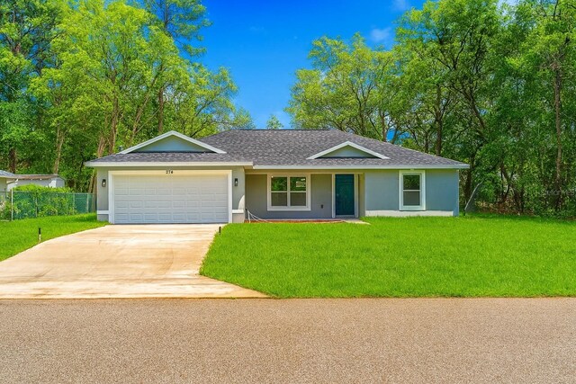 274 W Bolero Pl, Citrus Springs, FL 34434 - ranch-style home with stucco siding, a shingled roof, an attached garage, and driveway