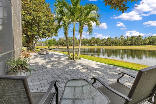 view of patio / terrace with a water view