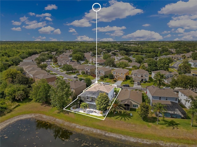 birds eye view of property featuring a water view and a residential view