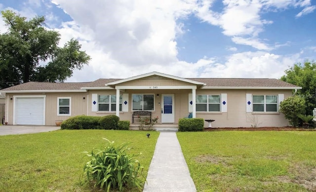 145 Hill Dr, Panama City, FL 32404 - ranch-style home featuring a porch, an attached garage, and a front yard