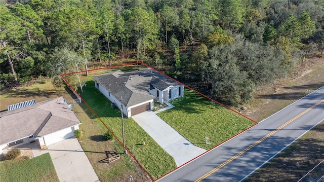 aerial view with a wooded view