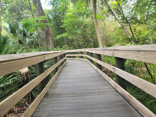 dock area with a forest view