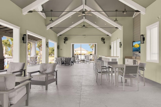 view of patio / terrace featuring ceiling fan and outdoor dining space