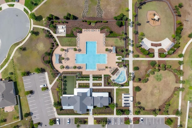 drone / aerial view of a pool