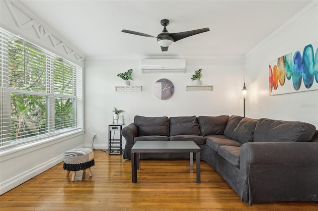 318 E Jersey St, Orlando, FL 32806 - living room featuring a wall mounted AC, ceiling fan, wood finished floors, baseboards, and crown molding