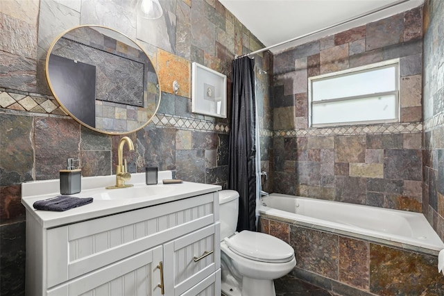 318 E Jersey St, Orlando, FL 32806 - bathroom featuring tile walls, tiled shower / bath combo, toilet, and vanity