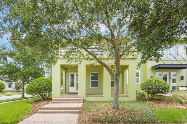 14244 Walcott Ave, Orlando, FL 32827 - view of front of home featuring stucco siding and covered porch