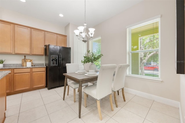 14244 Walcott Ave, Orlando, FL 32827 - dining space with a chandelier, light tile patterned flooring, and recessed lighting