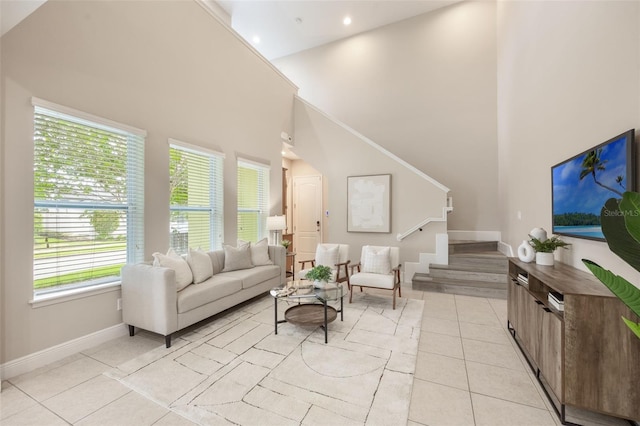 14244 Walcott Ave, Orlando, FL 32827 - living room with light tile patterned floors, stairs, high vaulted ceiling, and recessed lighting