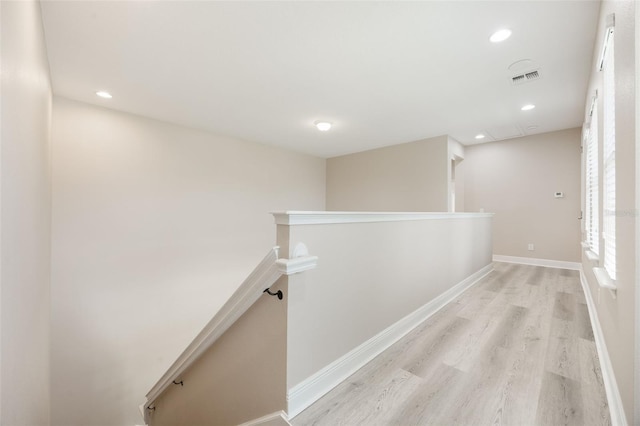 14244 Walcott Ave, Orlando, FL 32827 - corridor featuring an upstairs landing, light wood-type flooring, and recessed lighting