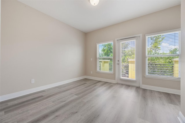 14244 Walcott Ave, Orlando, FL 32827 - empty room featuring light wood-style flooring and baseboards
