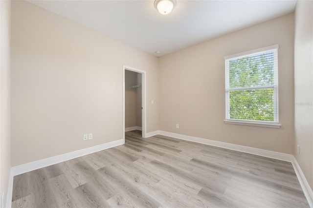 14244 Walcott Ave, Orlando, FL 32827 - empty room with light wood-style flooring