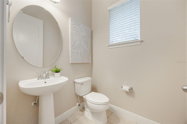 14244 Walcott Ave, Orlando, FL 32827 - bathroom with toilet and tile patterned floors