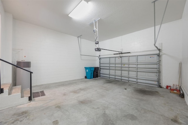 14244 Walcott Ave, Orlando, FL 32827 - garage with concrete block wall and a garage door opener