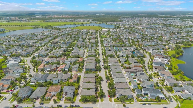 14244 Walcott Ave, Orlando, FL 32827 - aerial overview of property's location with a large body of water and nearby suburban area