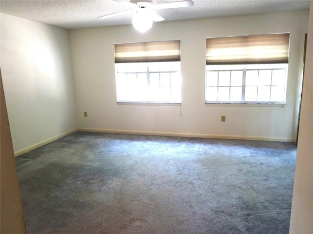 672 Post Oak Cir Unit 106, Altamonte Springs, FL 32701 - carpeted spare room featuring a ceiling fan, a textured ceiling, healthy amount of natural light, and baseboards