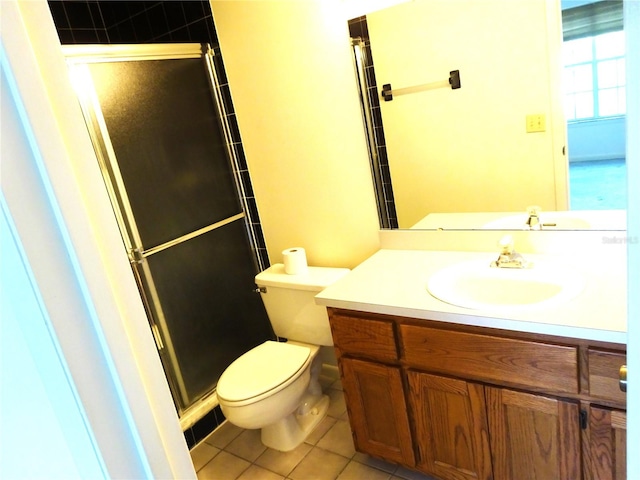 672 Post Oak Cir Unit 106, Altamonte Springs, FL 32701 - full bath with a shower stall, tile patterned flooring, toilet, and vanity