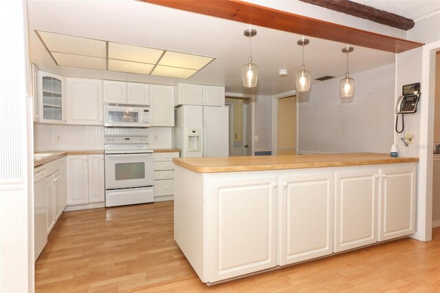 4141 Fallwood Cir, Orlando, FL 32812 - kitchen with white appliances, light wood-style flooring, and white cabinetry