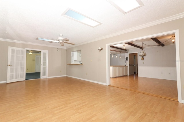 4141 Fallwood Cir, Orlando, FL 32812 - spare room with light wood finished floors, crown molding, a ceiling fan, and french doors