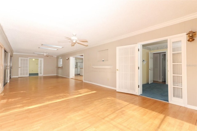 4141 Fallwood Cir, Orlando, FL 32812 - unfurnished room featuring ceiling fan, light wood-style floors, crown molding, french doors, and baseboards