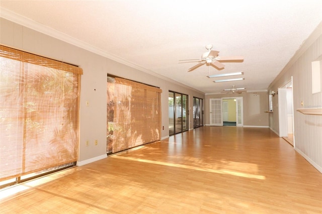 4141 Fallwood Cir, Orlando, FL 32812 - unfurnished room with crown molding, ceiling fan, wood finished floors, and baseboards