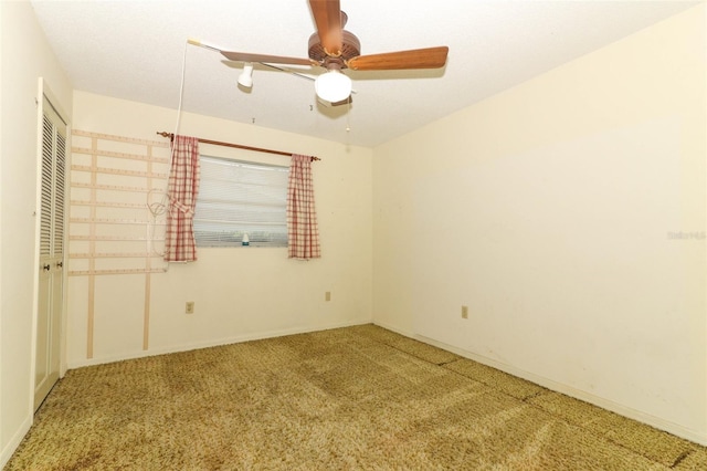 4141 Fallwood Cir, Orlando, FL 32812 - unfurnished bedroom featuring carpet, a ceiling fan, and baseboards