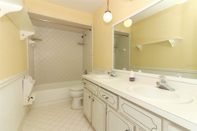 4141 Fallwood Cir, Orlando, FL 32812 - bathroom featuring tile patterned flooring, toilet, washtub / shower combination, and double vanity