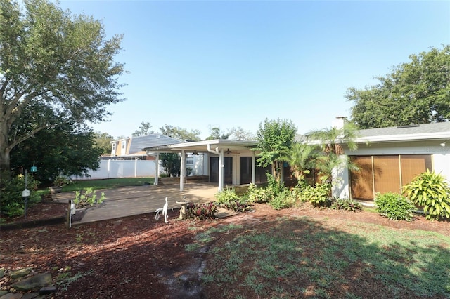 4141 Fallwood Cir, Orlando, FL 32812 - rear view of property featuring fence