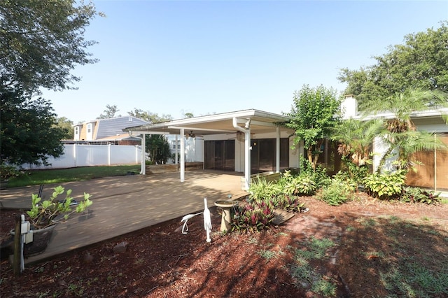 4141 Fallwood Cir, Orlando, FL 32812 - back of house with fence and a sunroom