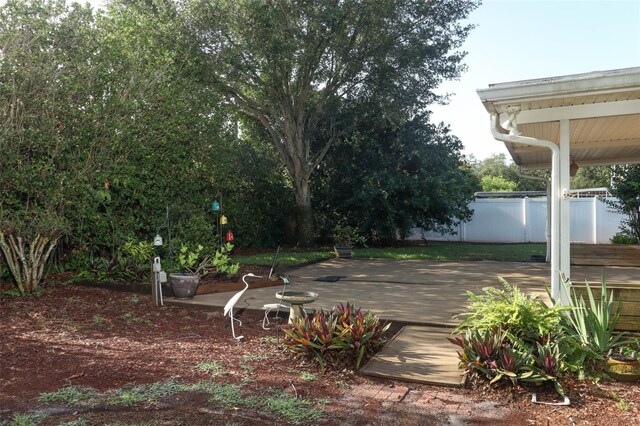 4141 Fallwood Cir, Orlando, FL 32812 - view of yard with fence and a deck