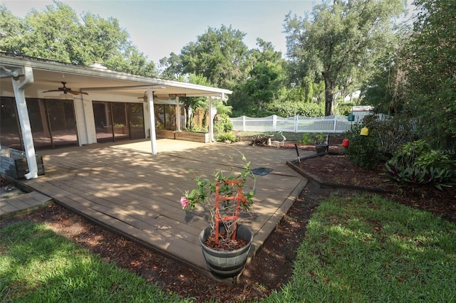 4141 Fallwood Cir, Orlando, FL 32812 - view of patio featuring a ceiling fan, fence, and a wooden deck