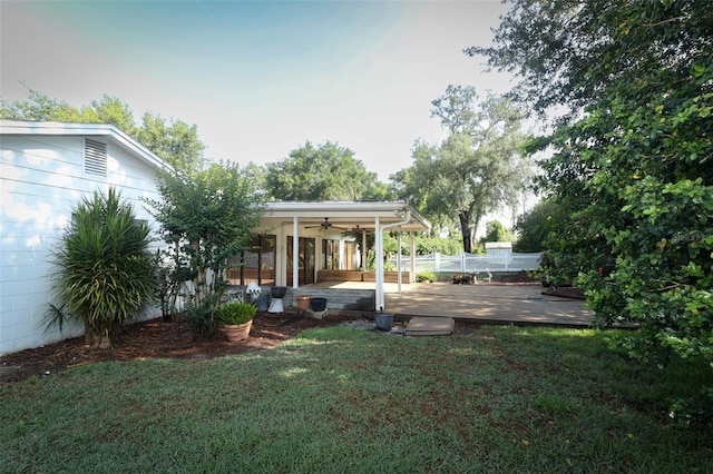4141 Fallwood Cir, Orlando, FL 32812 - view of yard with ceiling fan and a patio area