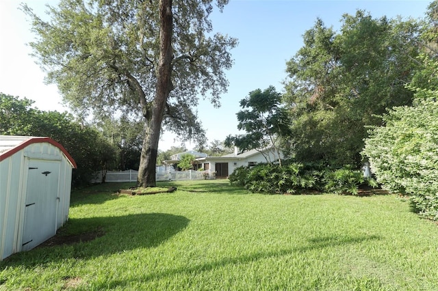 4141 Fallwood Cir, Orlando, FL 32812 - view of yard featuring a storage shed and an outbuilding