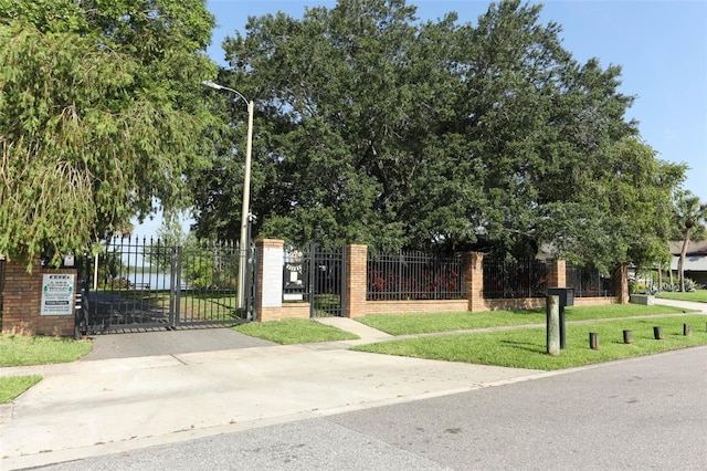 4141 Fallwood Cir, Orlando, FL 32812 - view of front of property featuring a gate and brick siding