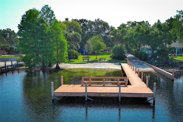 4141 Fallwood Cir, Orlando, FL 32812 - dock featuring a water view and view of scattered trees