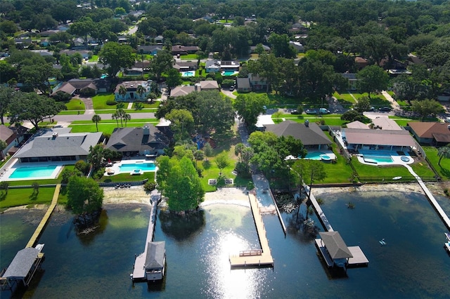 4141 Fallwood Cir, Orlando, FL 32812 - view of property location with a large body of water, nearby suburban area, and a pool area