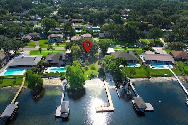 4141 Fallwood Cir, Orlando, FL 32812 - aerial view of property's location with a nearby body of water, nearby suburban area, and a pool area