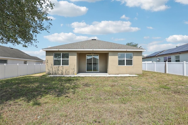back of house featuring stucco siding, a ceiling fan, and a patio area