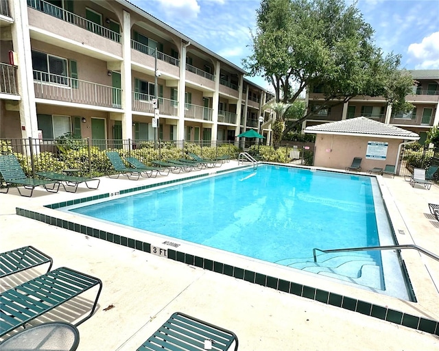 109 Oyster Bay Cir Unit 120, Altamonte Springs, FL 32701 - community pool with fence and a patio area
