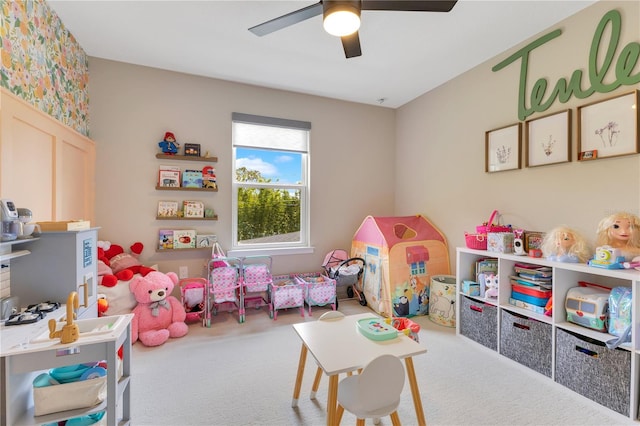 recreation room featuring ceiling fan and carpet flooring
