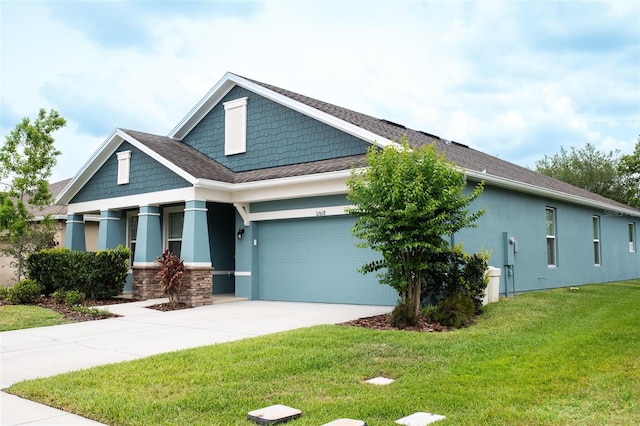 32618 Rapids Loop, Wesley Chapel, FL 33545 - craftsman-style home with concrete driveway, an attached garage, a front yard, and stucco siding