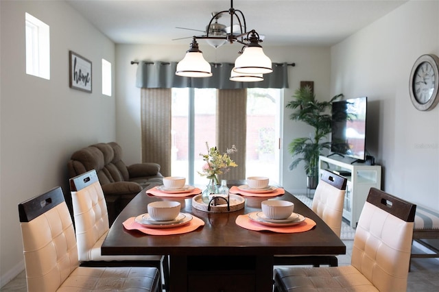 32618 Rapids Loop, Wesley Chapel, FL 33545 - dining room with a chandelier