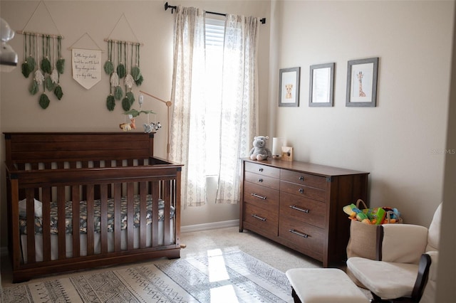 32618 Rapids Loop, Wesley Chapel, FL 33545 - bedroom featuring a nursery area and light colored carpet