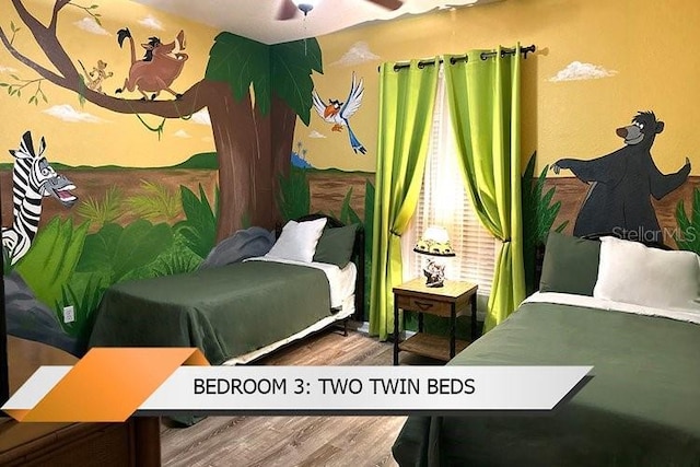 8101 Resort Village Dr Unit 31501, Orlando, FL 32821 - bedroom with wood finished floors