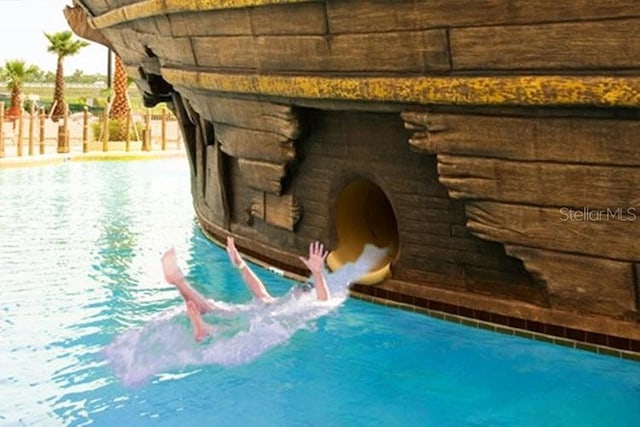 8101 Resort Village Dr Unit 31501, Orlando, FL 32821 - view of pool featuring a water slide