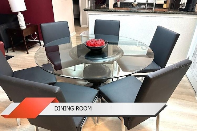 8125 Resort Village Dr Unit 51201, Orlando, FL 32821 - dining space featuring wood finished floors