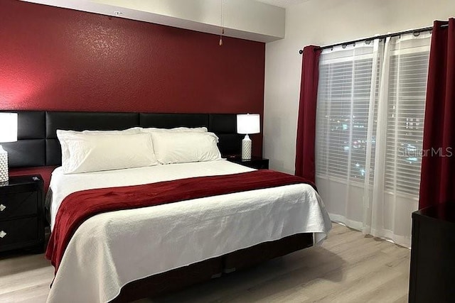 8125 Resort Village Dr Unit 51201, Orlando, FL 32821 - bedroom featuring light wood-type flooring