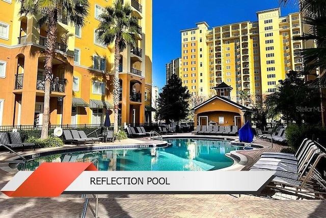 8125 Resort Village Dr Unit 51201, Orlando, FL 32821 - pool featuring fence
