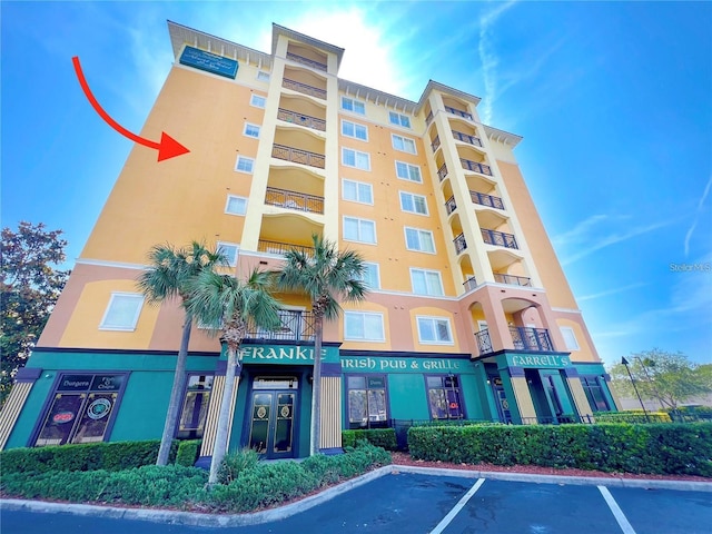 8112 Poinciana Blvd Unit 1502, Orlando, FL 32821 - view of building exterior with uncovered parking